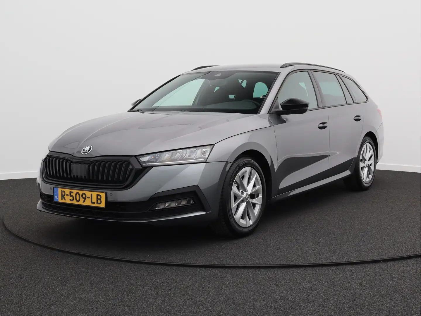 Skoda Octavia Combi 1.0 TSI Sport Business/ trekhaak/ zeer mooi! Grijs - 1