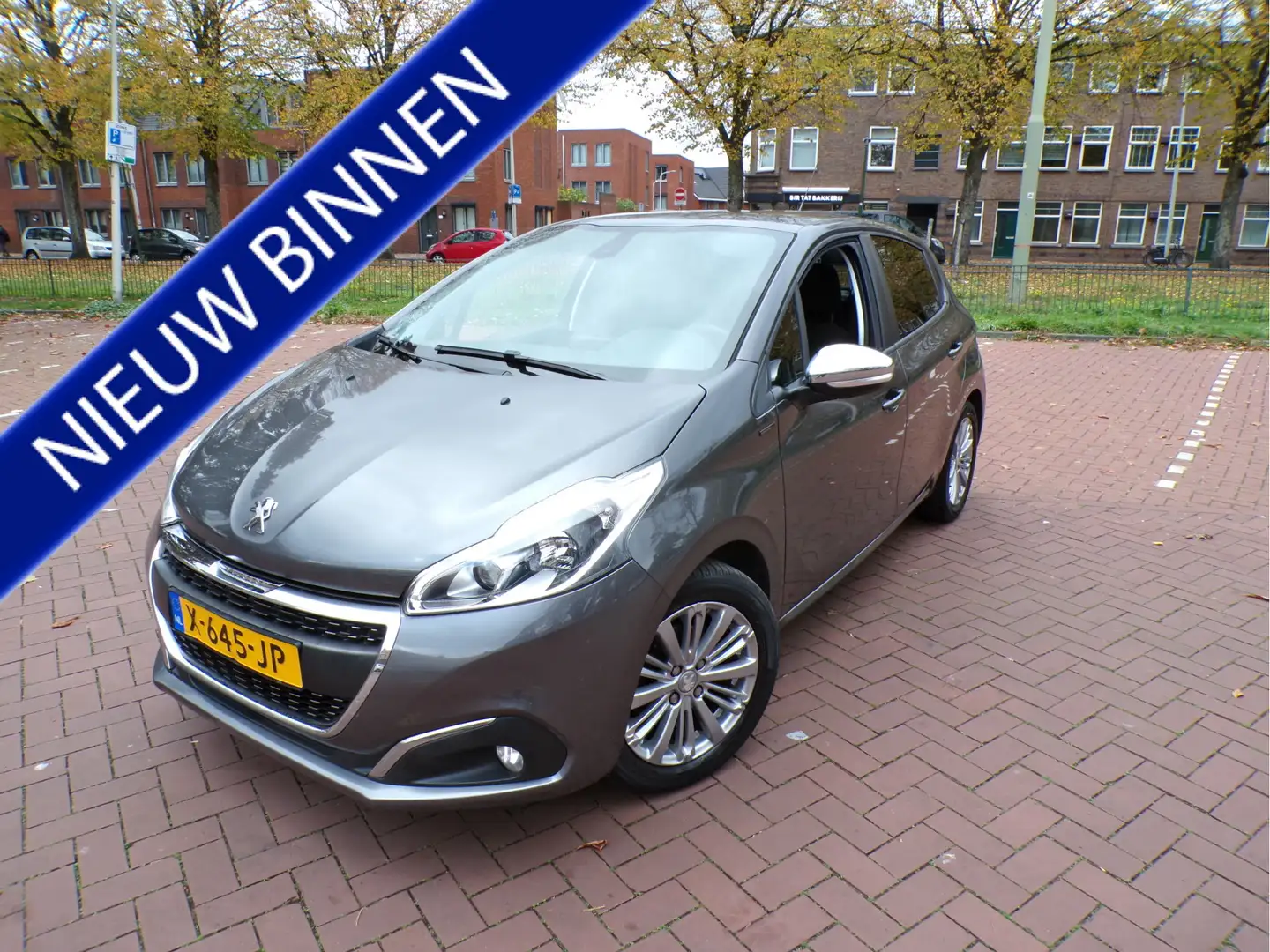 Peugeot 208 1.2 PureTech Signature NAVI TEL CRUISECONT APPLE C Gris - 1