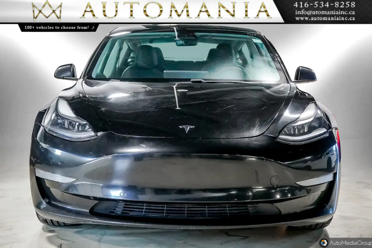 Tesla Model 3 снимка Tesla Model 3