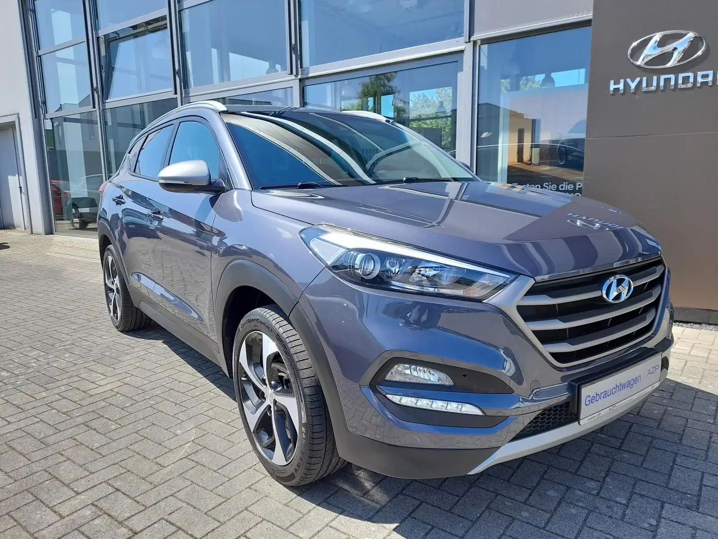 Hyundai TUCSON 1.6 T-GDI Advantage Klimaaut.Navi.AHK.LM Grau - 1