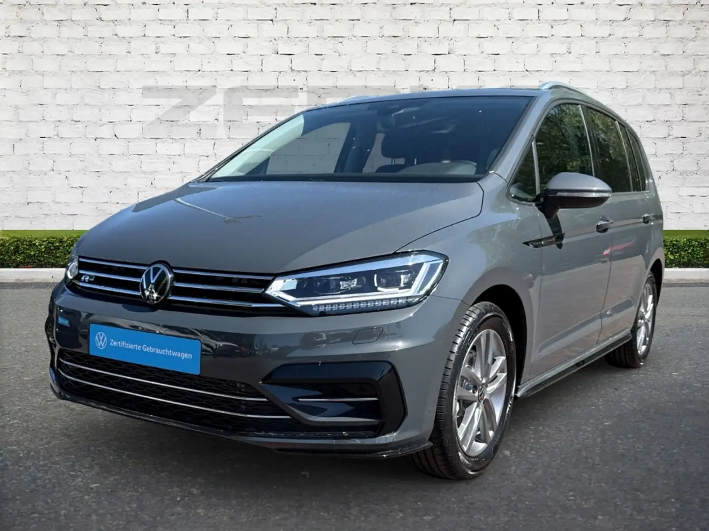 Volkswagen Touran 1.5 TSI DSG Comfortline Sportpaket Navi Digitales Grijs - 1