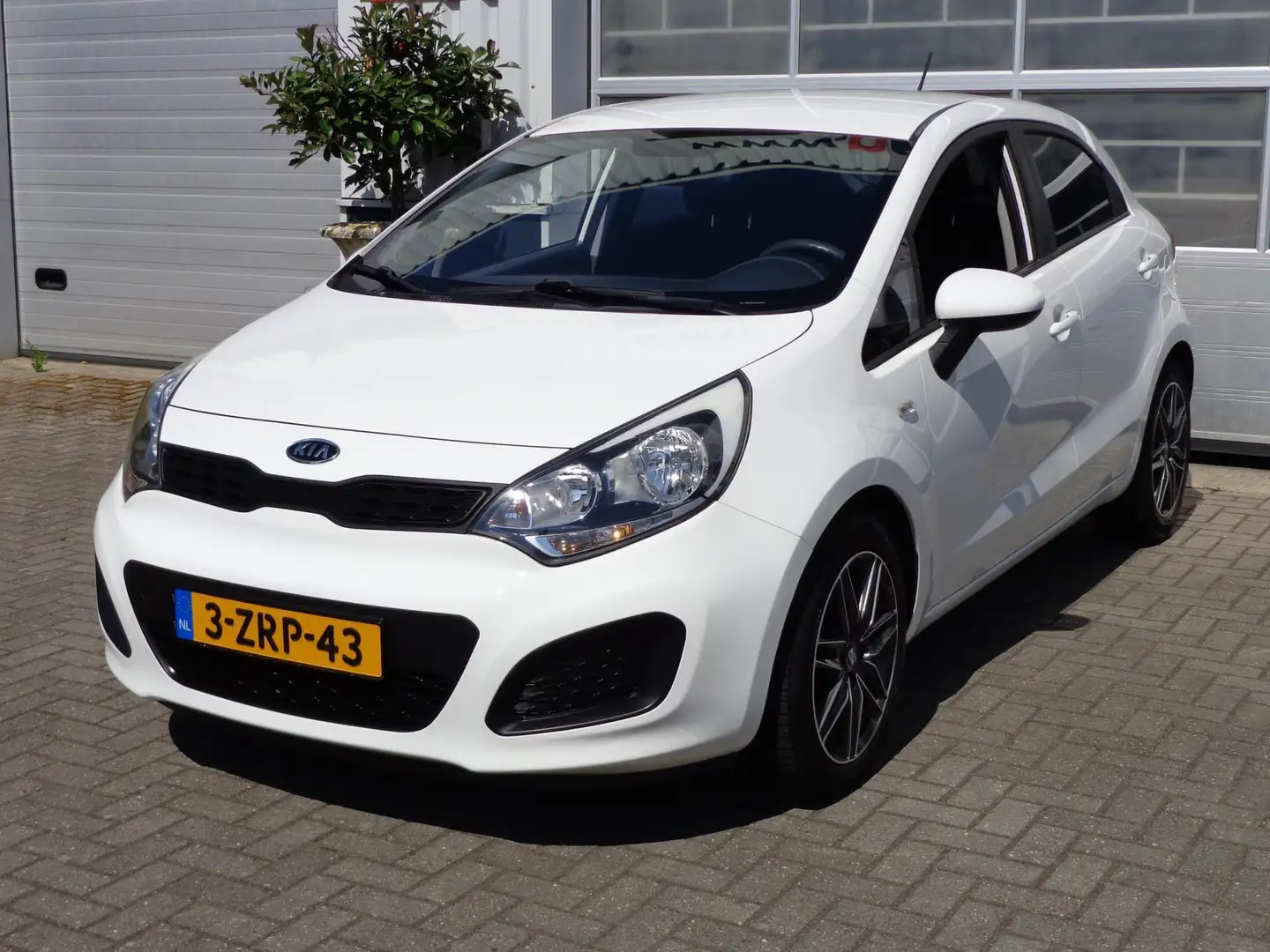 Kia Rio 1.4 CVVT Plus Pack Airco !!, 5 Deurs Wit - 1