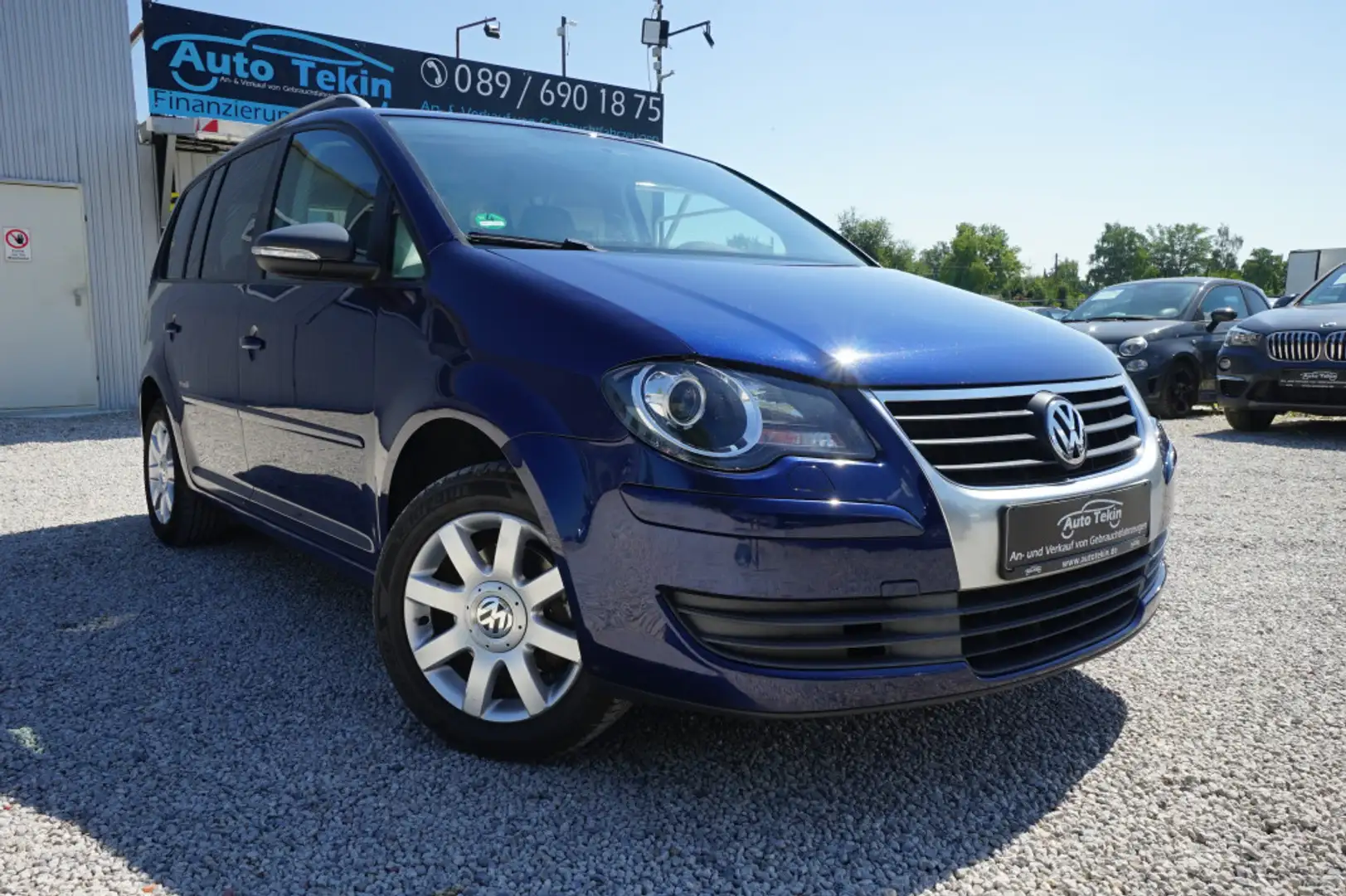 Volkswagen Touran 1.6 Freestyle |7-Sitzer| |Navi| |Tempom.| Azul - 1