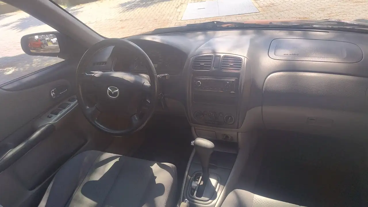 Mazda 323F 1.6 Exclusive C. Autom clima ASI CRS Neopat., foto 8