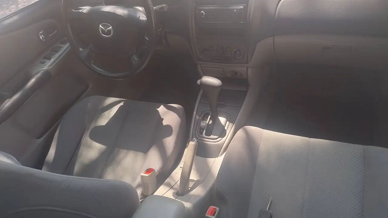 Mazda 323F 1.6 Exclusive C. Autom clima ASI CRS Neopat., foto 9