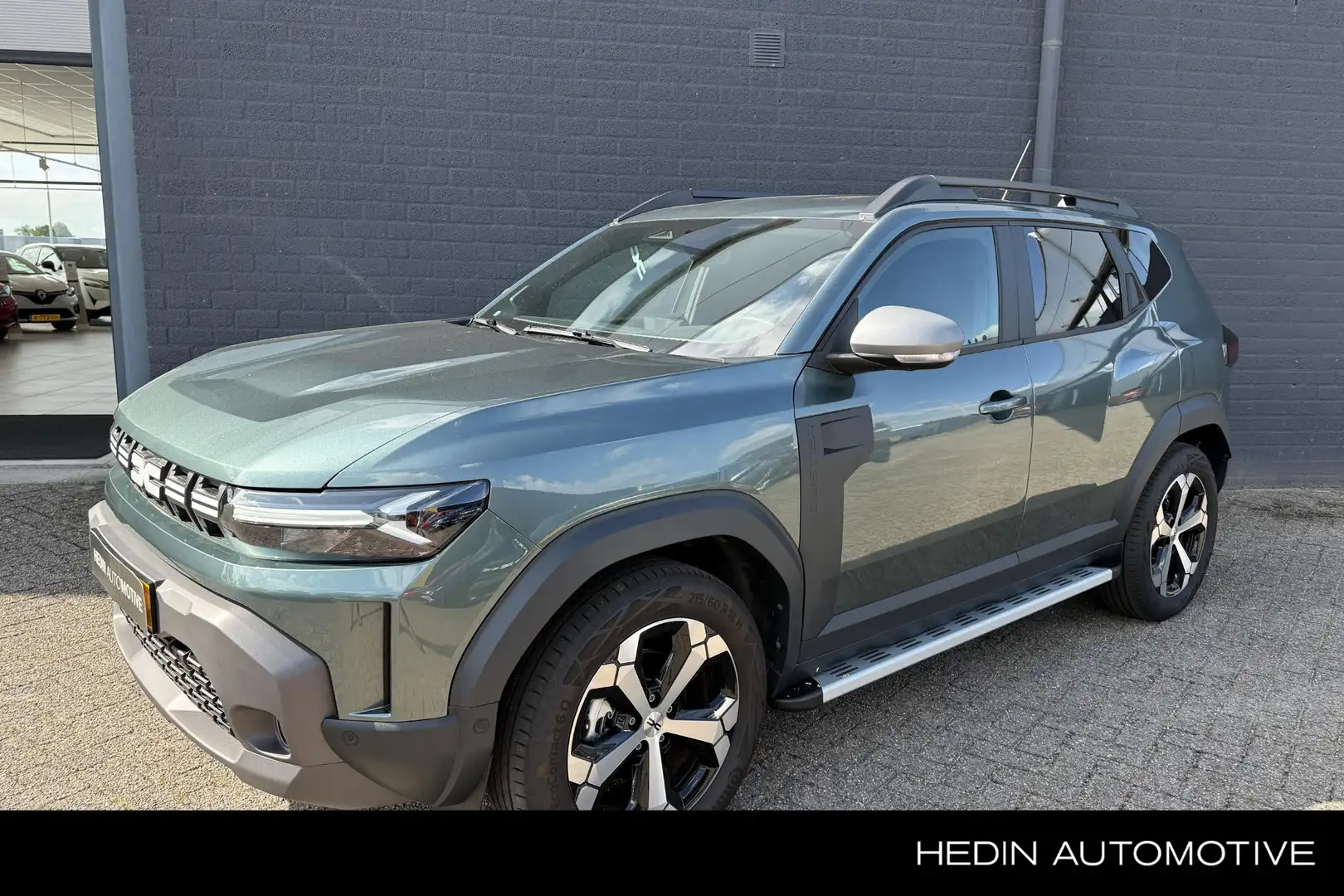 Dacia Duster 1.6 Hybrid 140 Journey Groen - 1