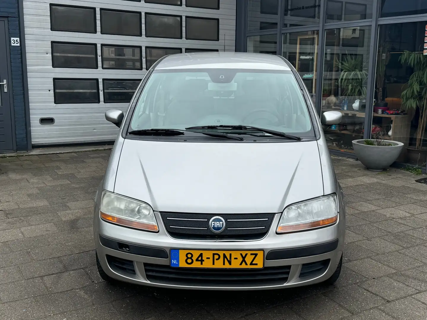 Fiat Idea 1.4-16V Emotion | Clima | Cruise | PDC | N.A.P Gris - 2