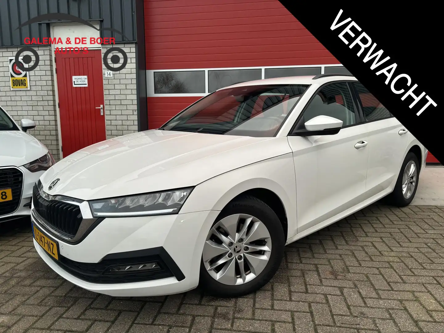 Skoda Octavia Combi 1.0 TSI Business Edition TREKHAAK / FULL LED Wit - 1