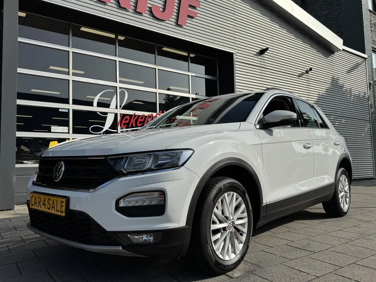 Volkswagen T-Roc 1.0 TSI Style - Navigatie/Apple Carplay I Airco I Wit - 1
