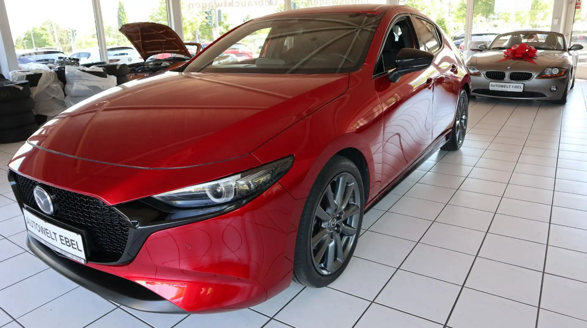 Mazda 3 Lim.*150PS*AUTOMATIK*360° KAMERA*LED*1. HAND* Rood - 1
