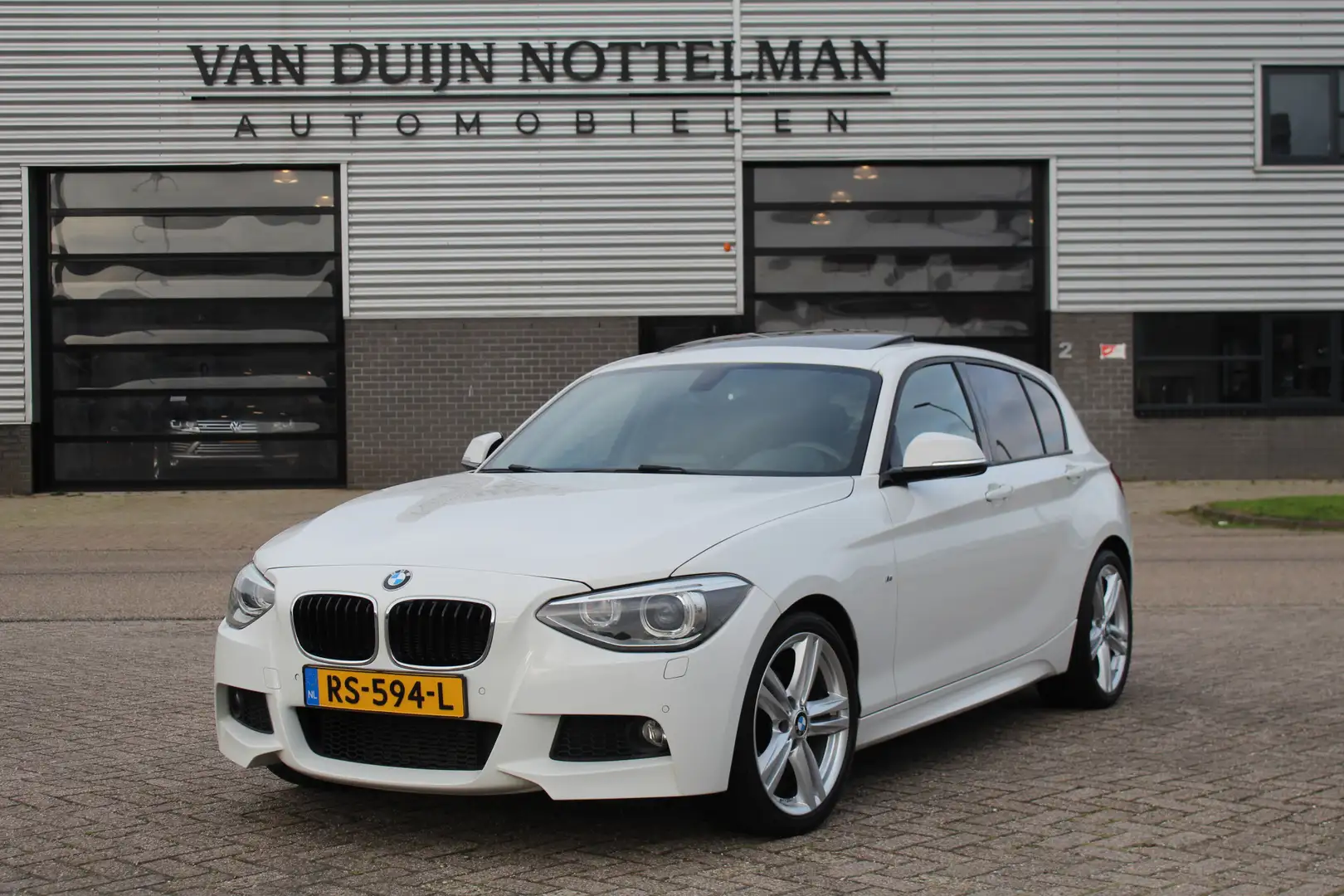 BMW 116 1-serie 116i M Sport Edition High Executive / Schu Wit - 1