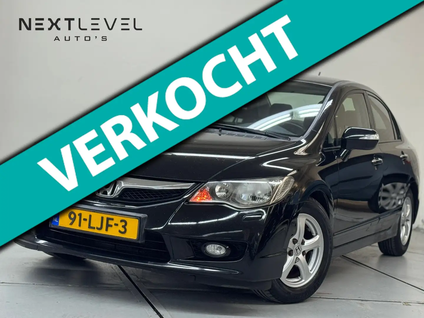 Honda Civic 1.3 Hybrid Elegance Airco Leder Navigatie Rijklaar Noir - 1