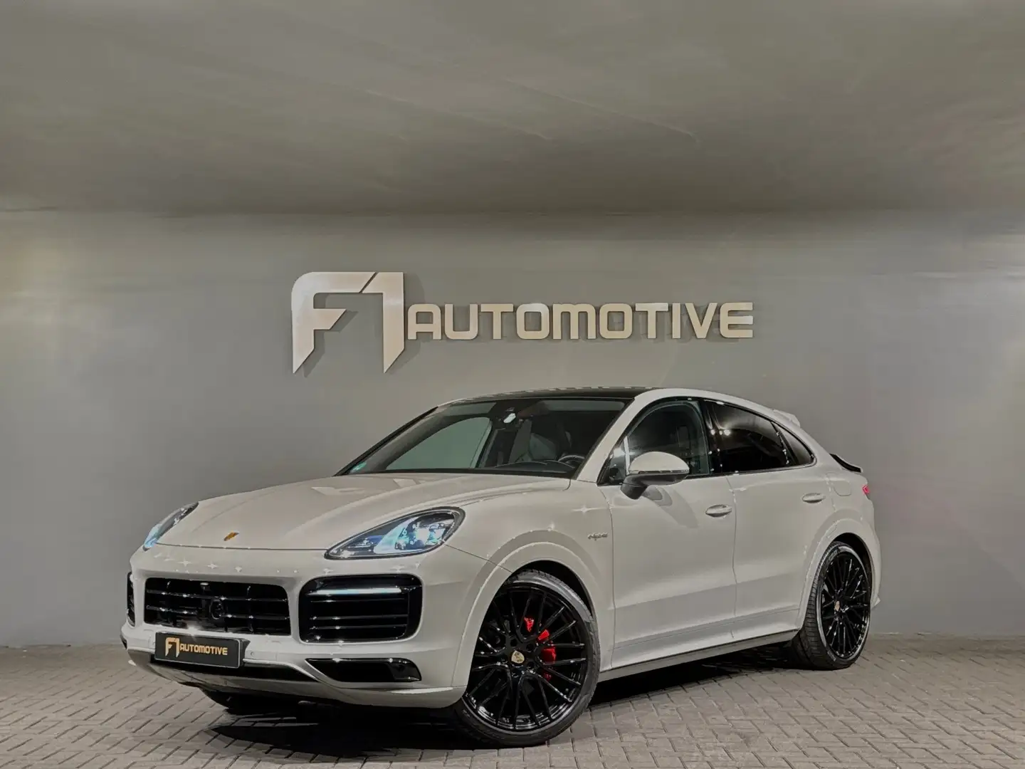 Porsche Cayenne Coupé 3.0 E-Hybrid Pano|Sportdesign|HuD|BOSE Grijs - 1