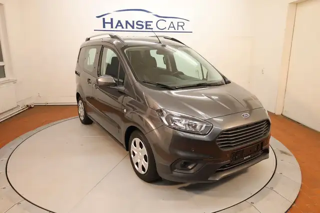 Ford Transit Courier Klima/Sitzh./PDC v+h/AHK/2xSchiebetür/Garantie !