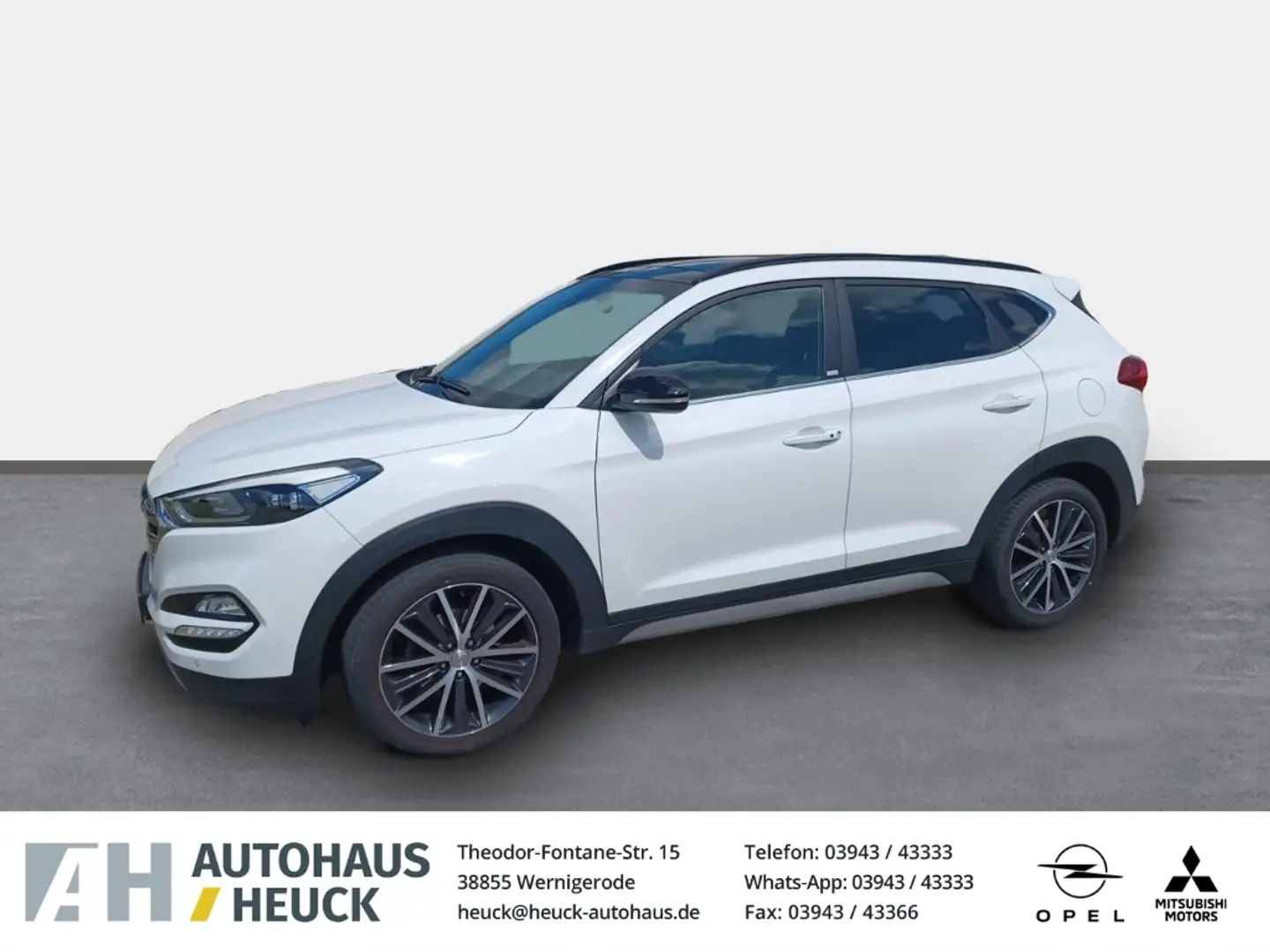 Hyundai TUCSON Passion + 2WD 1.6 El. Panodach Navi LED Mehrzonenk Weiß - 1