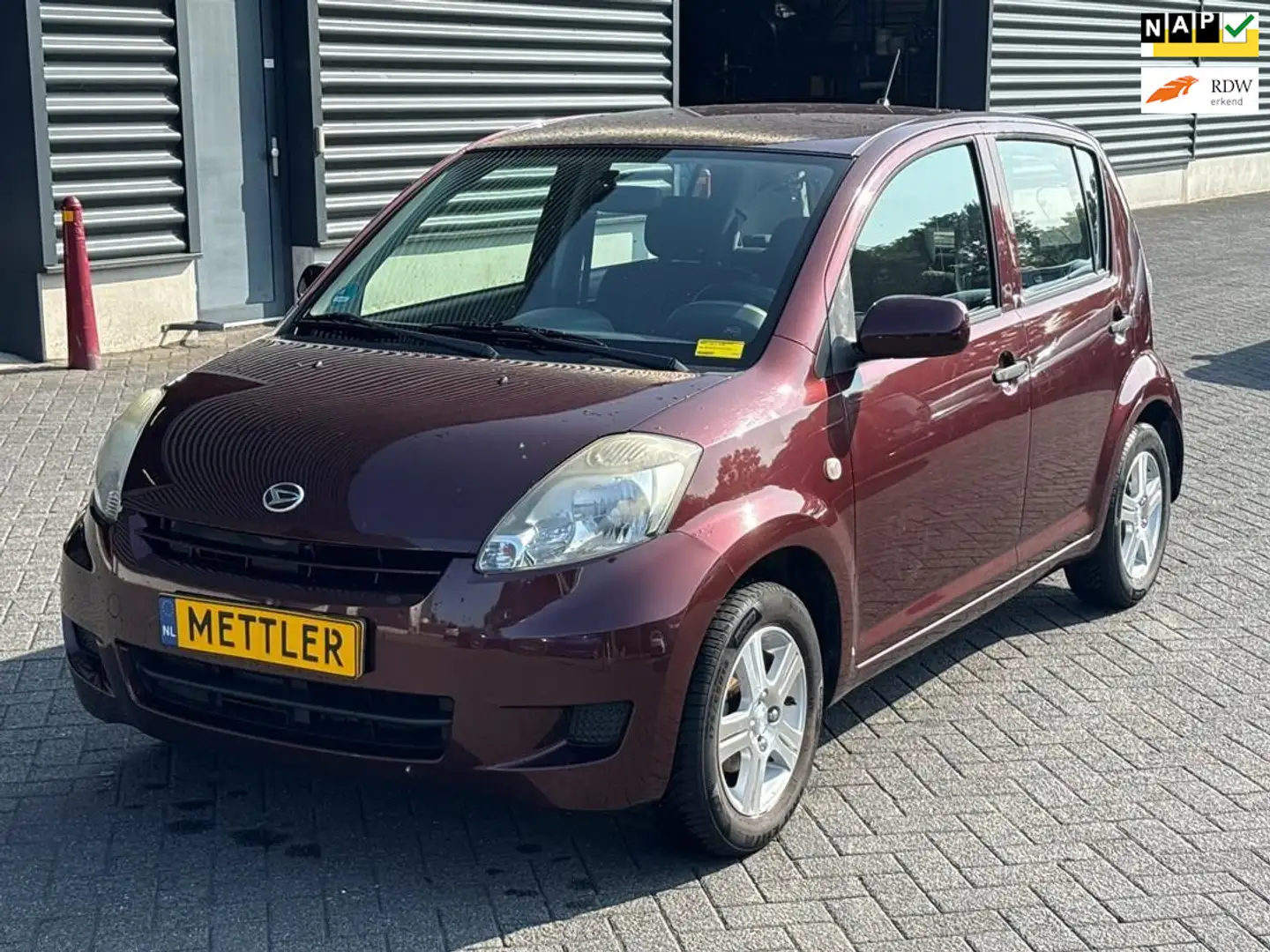 Daihatsu Sirion 2 1.0-12V Premium, Airco, NAP Red - 1