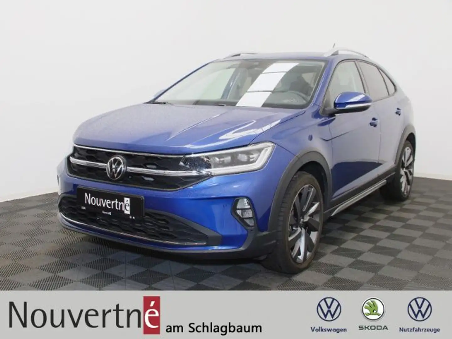 Volkswagen Taigo 1.5 TSI Style + AHK + IQ.Drive + beats Navi Blauw - 1