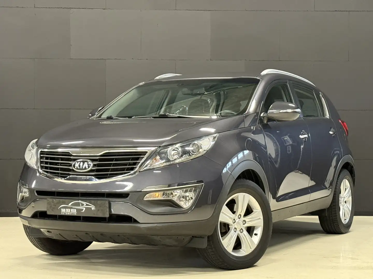 Kia Sportage 1.6 GDI ComfortLine | Stoelverw. | Trekhaak | PDC Gris - 1