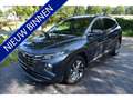 Hyundai TUCSON 1.6 T-GDI HEV Premium LEER, TREKHAAK NIEUWST. Grau - thumbnail 1