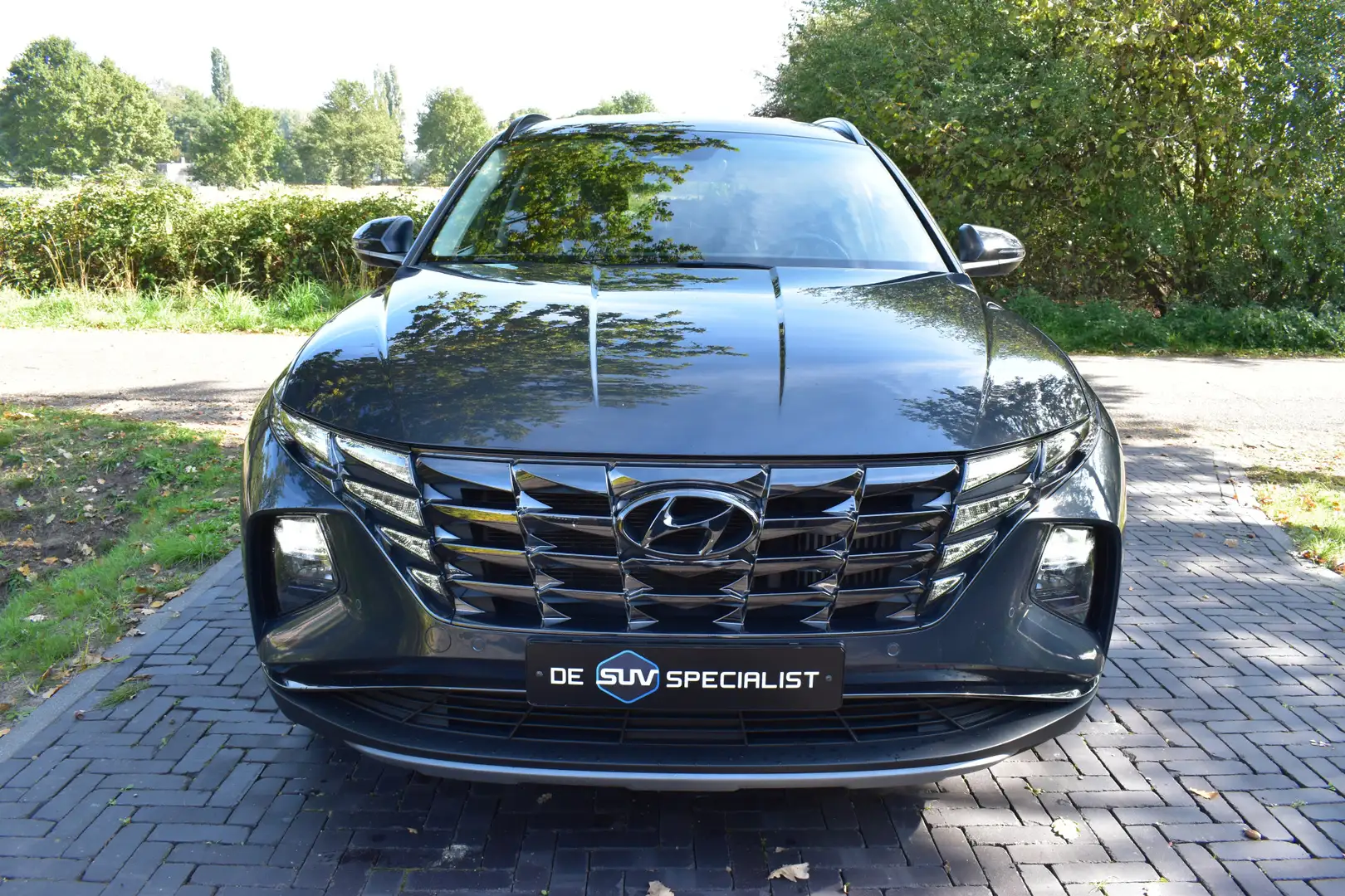 Hyundai TUCSON 1.6 T-GDI HEV Premium LEER, TREKHAAK NIEUWST. Grau - 2