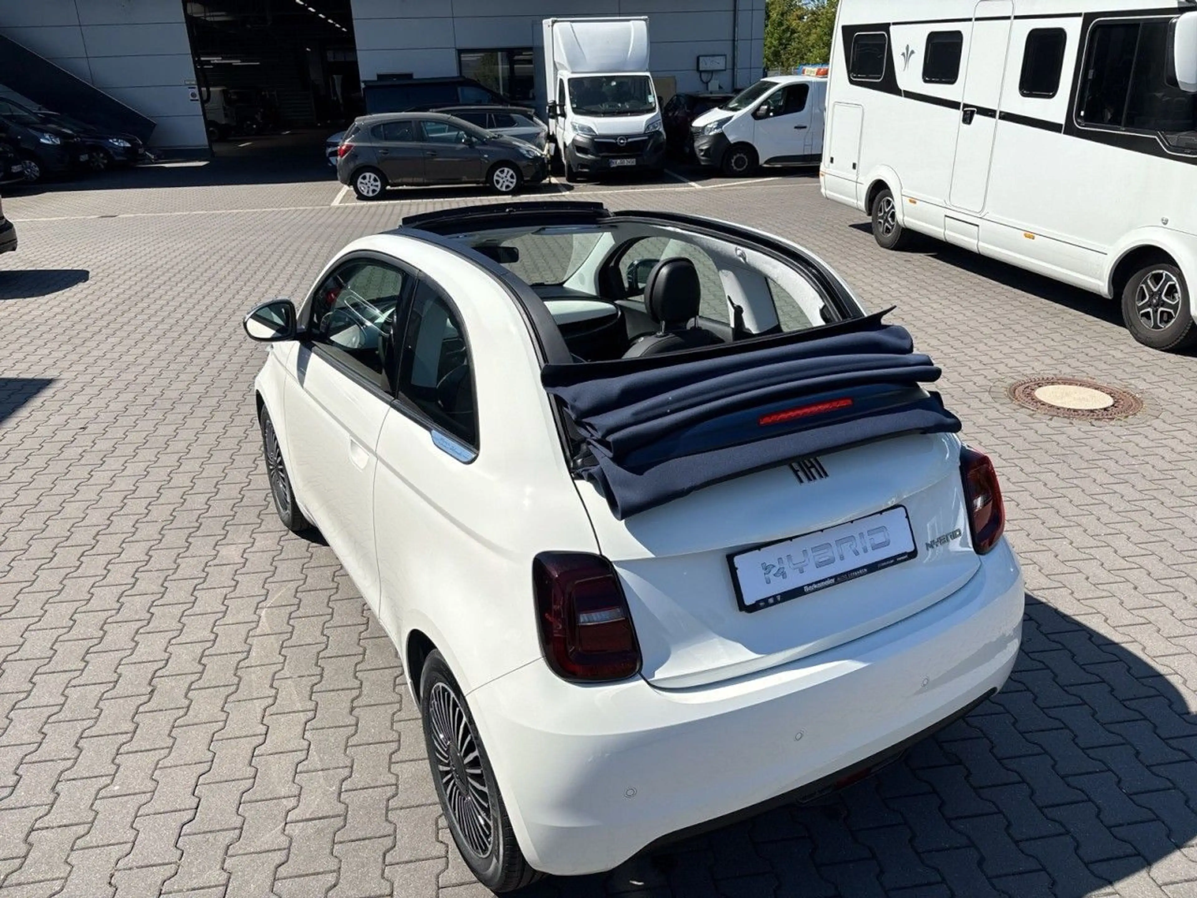 Fiat 500C Hybrid Dolcevita — photo 14