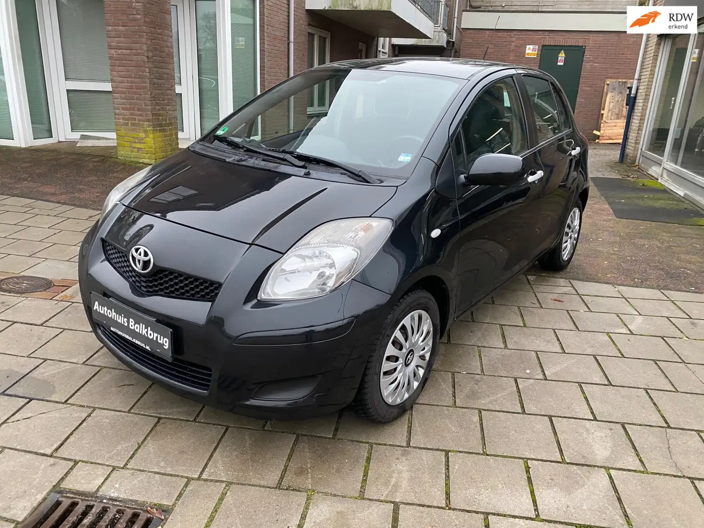 Toyota Yaris 1.0 VVTi Cool AIRCO CENTRAAL EL RAMEN 5 DEURS 9141 Zwart - 1