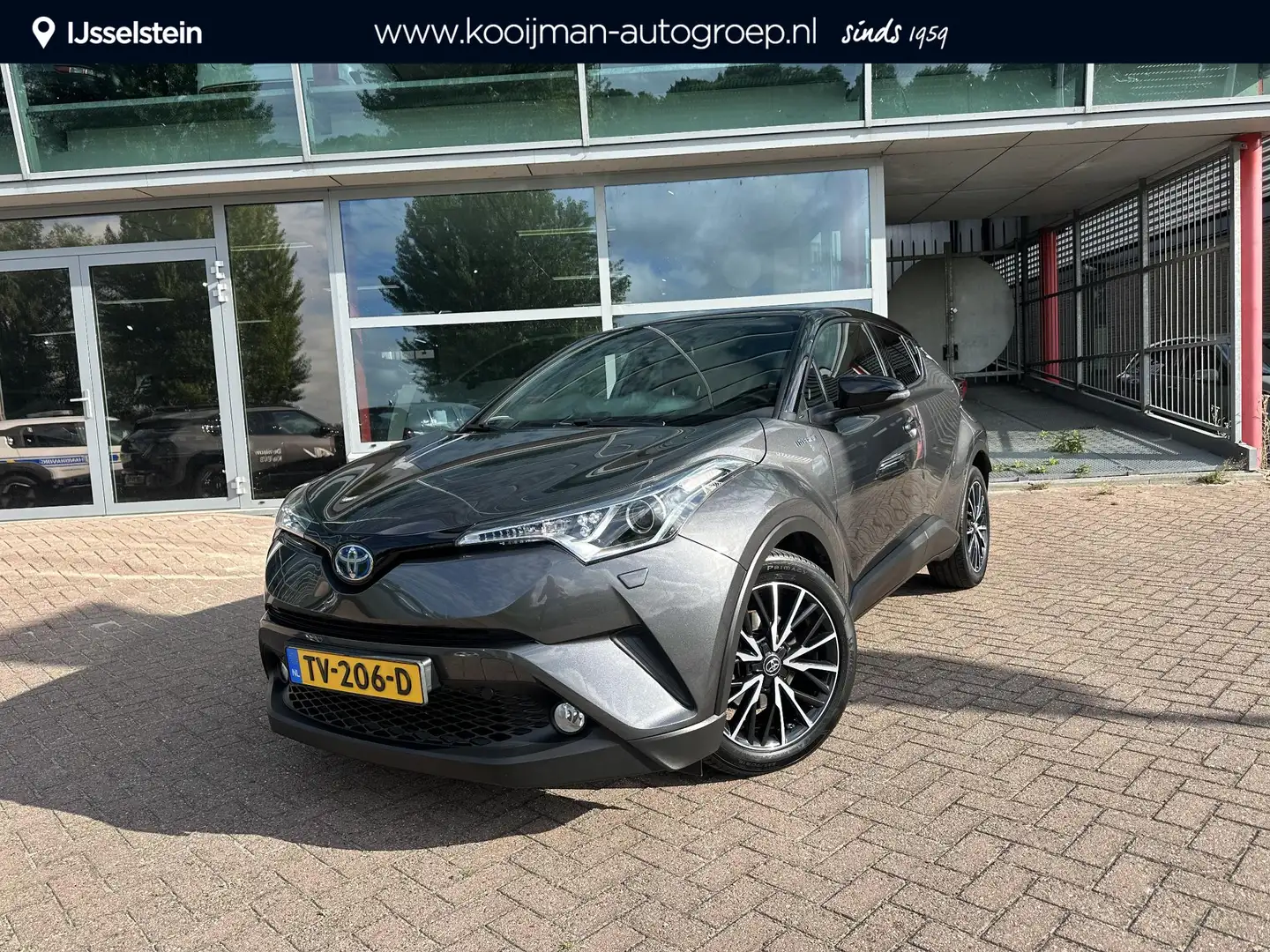 Toyota C-HR 1.8 Hybrid Bi-Tone Dealeronderhouden, Nette auto Grijs - 1