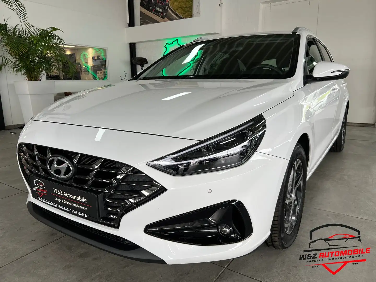 Hyundai i30 1.5 T-GDI 48V DCT Kombi +CarPlay+LED+SHZ+ Weiß - 1