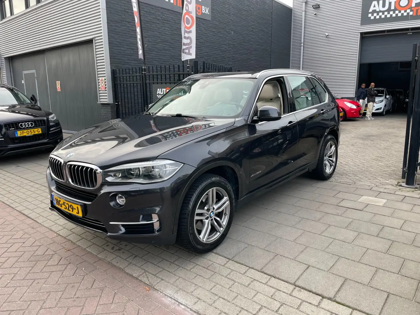 BMW X5 XDrive30d High Executive 7p. 2e Eigenaar! Pano Air Gris - 1