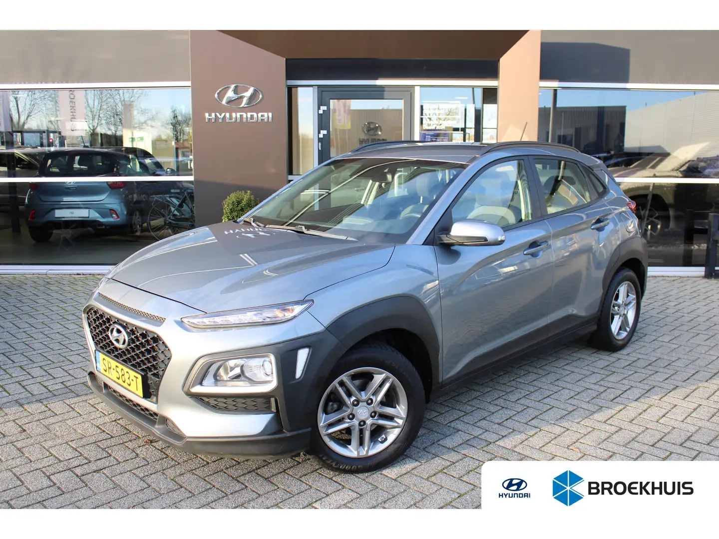 Hyundai KONA 1.0T Comfort | Parkeersensoren achter | Cruise Con Grijs - 1