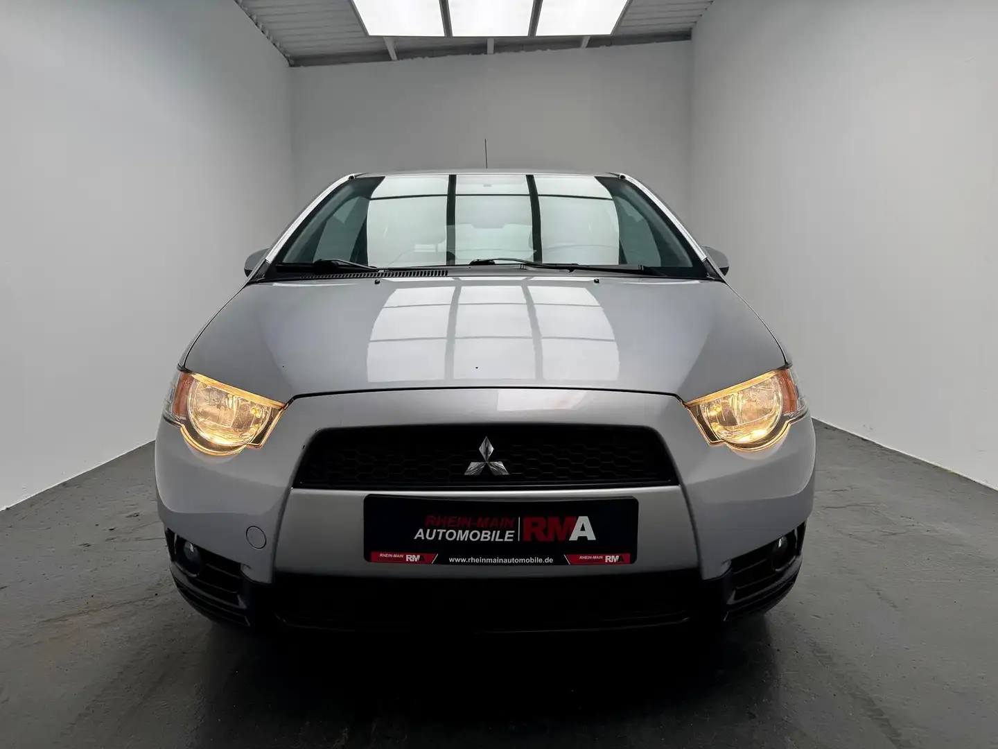 Mitsubishi Colt ClearTec 35 Jahre Plus 1.3+RADIO+KLIMA+SHZ+ Silber - 2
