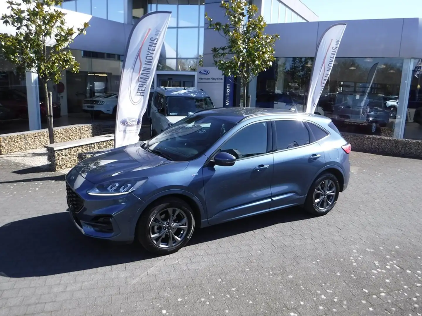 Ford Kuga ST-Line FHEV AUT Blauw - 1