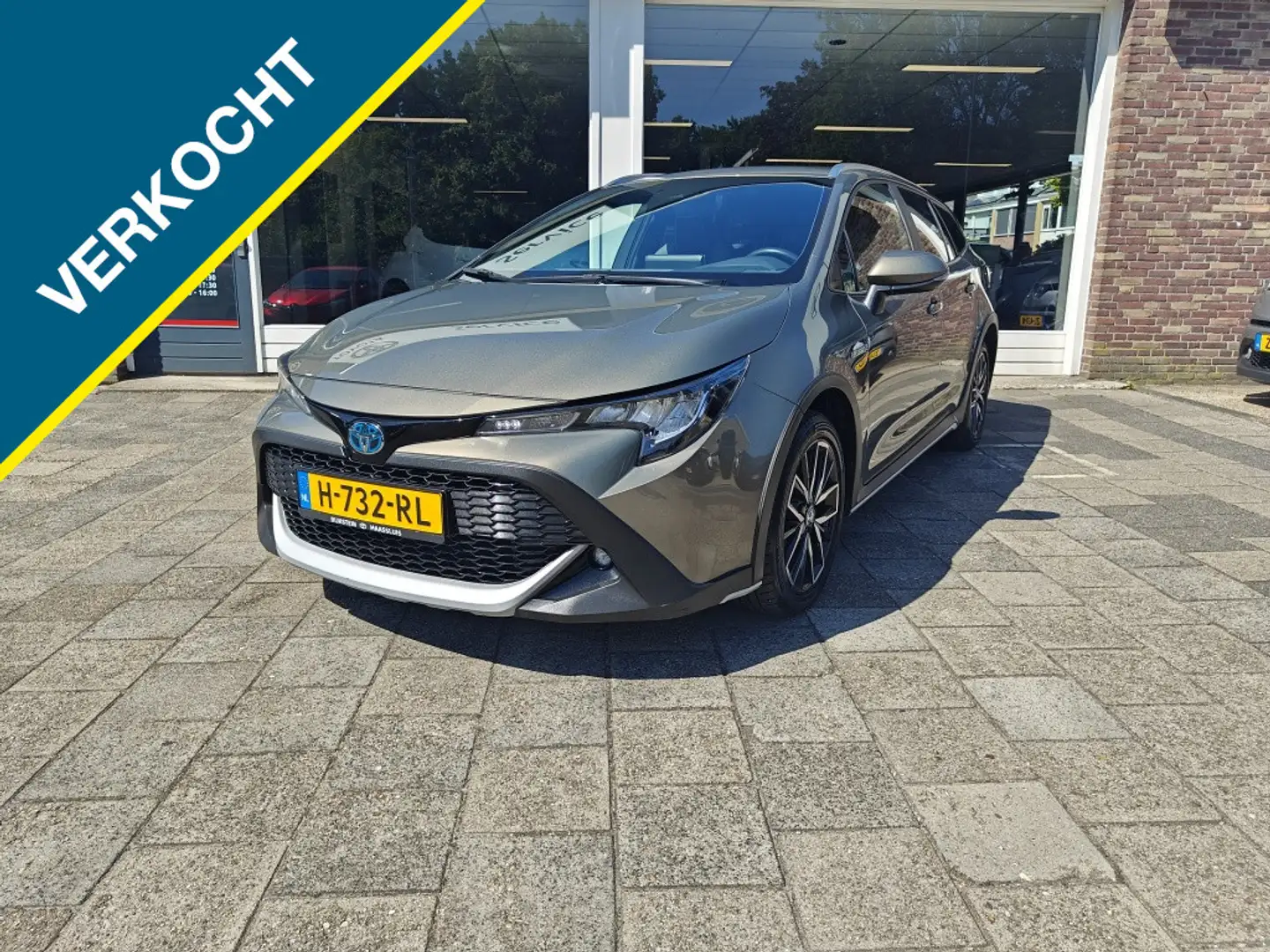 Toyota Corolla Touring Sports 1.8 Hybrid Trek Groen - 1
