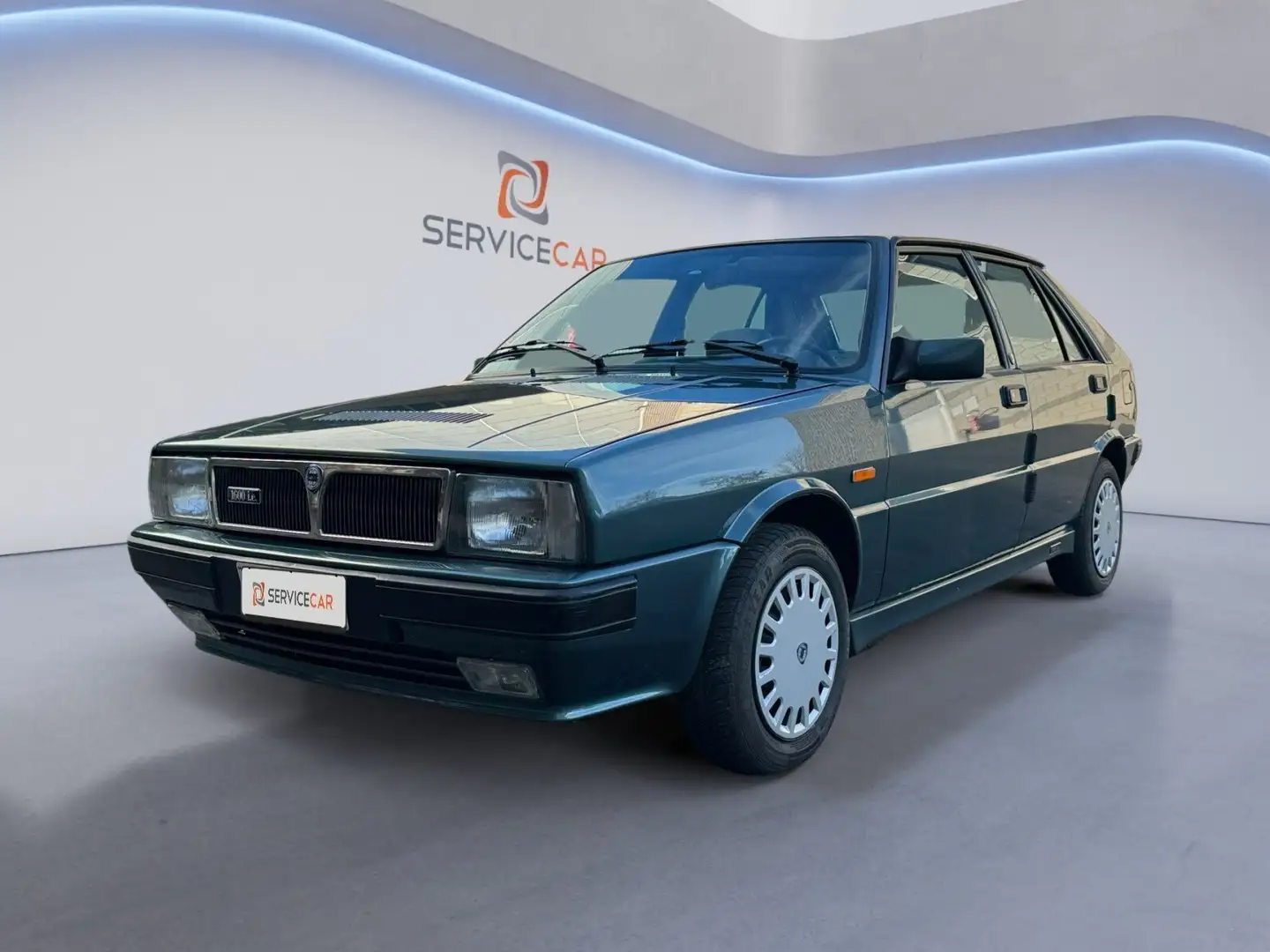 Lancia Delta 1.6 i.e. cat Vert - 1