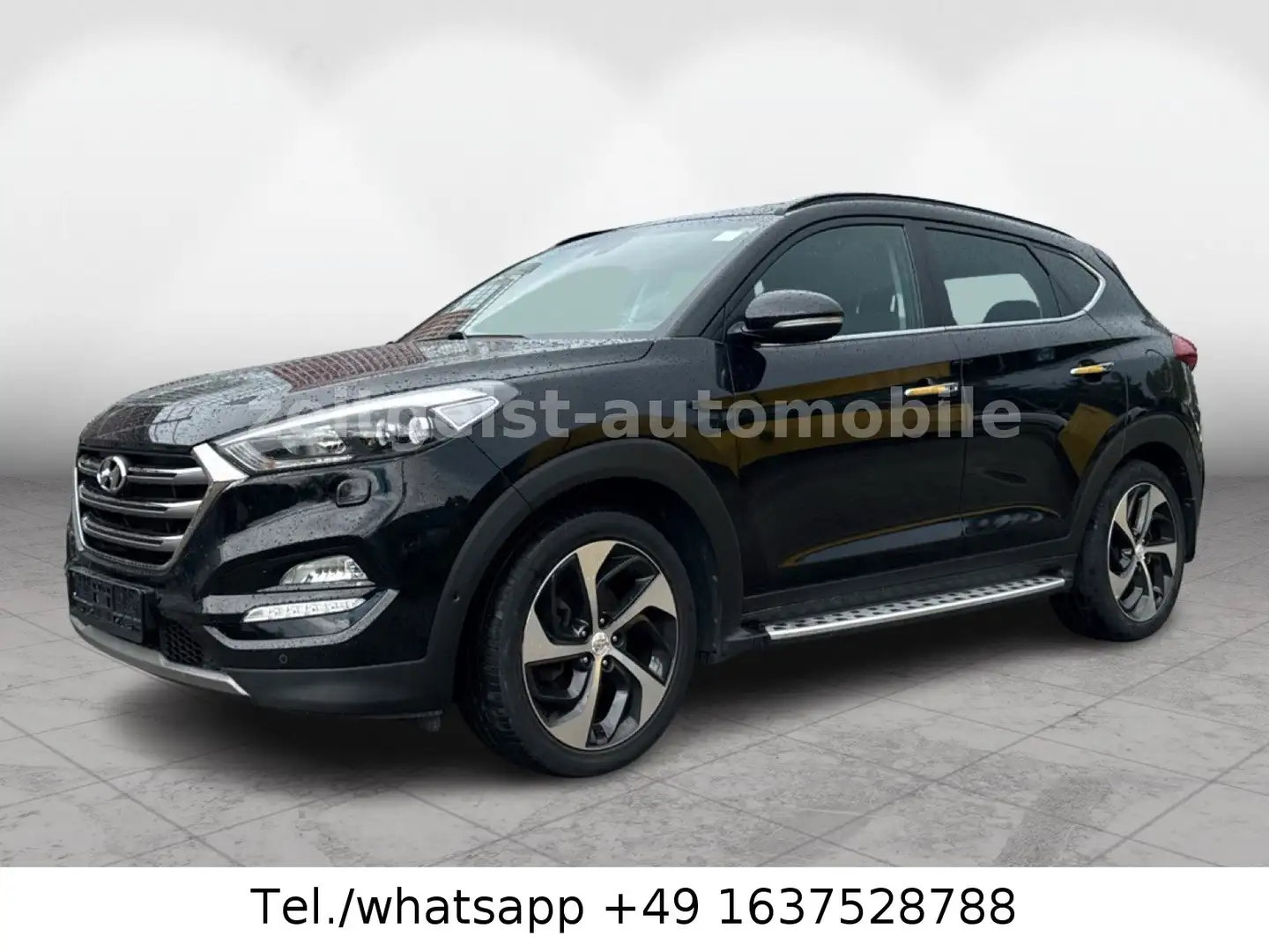 Hyundai TUCSON 2.0d*4WD*VOLL-AUSSTATTUNG* Zwart - 1