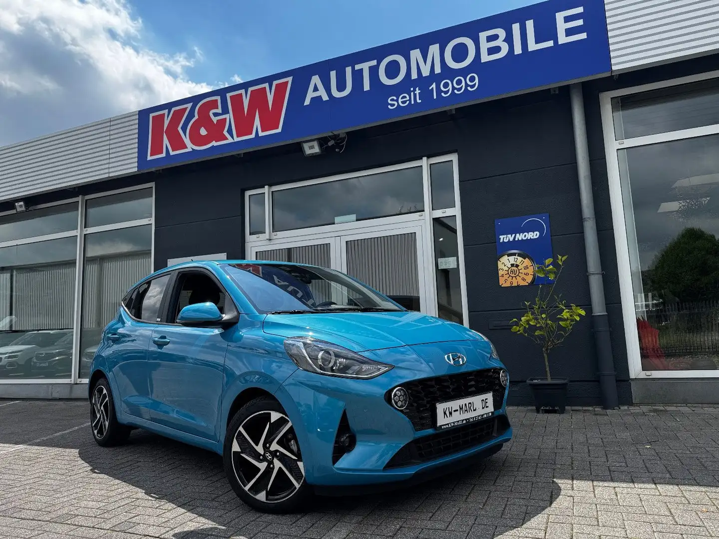 Hyundai i10 Style AUTOM.NAVI+CAM KLIMAAUTO SHZ.ALLWETTER - 1