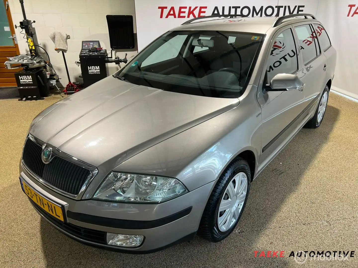 Skoda Octavia Combi 1.6 Ambiente Airco/Cruise/Nap/1eEIG Beige - 1