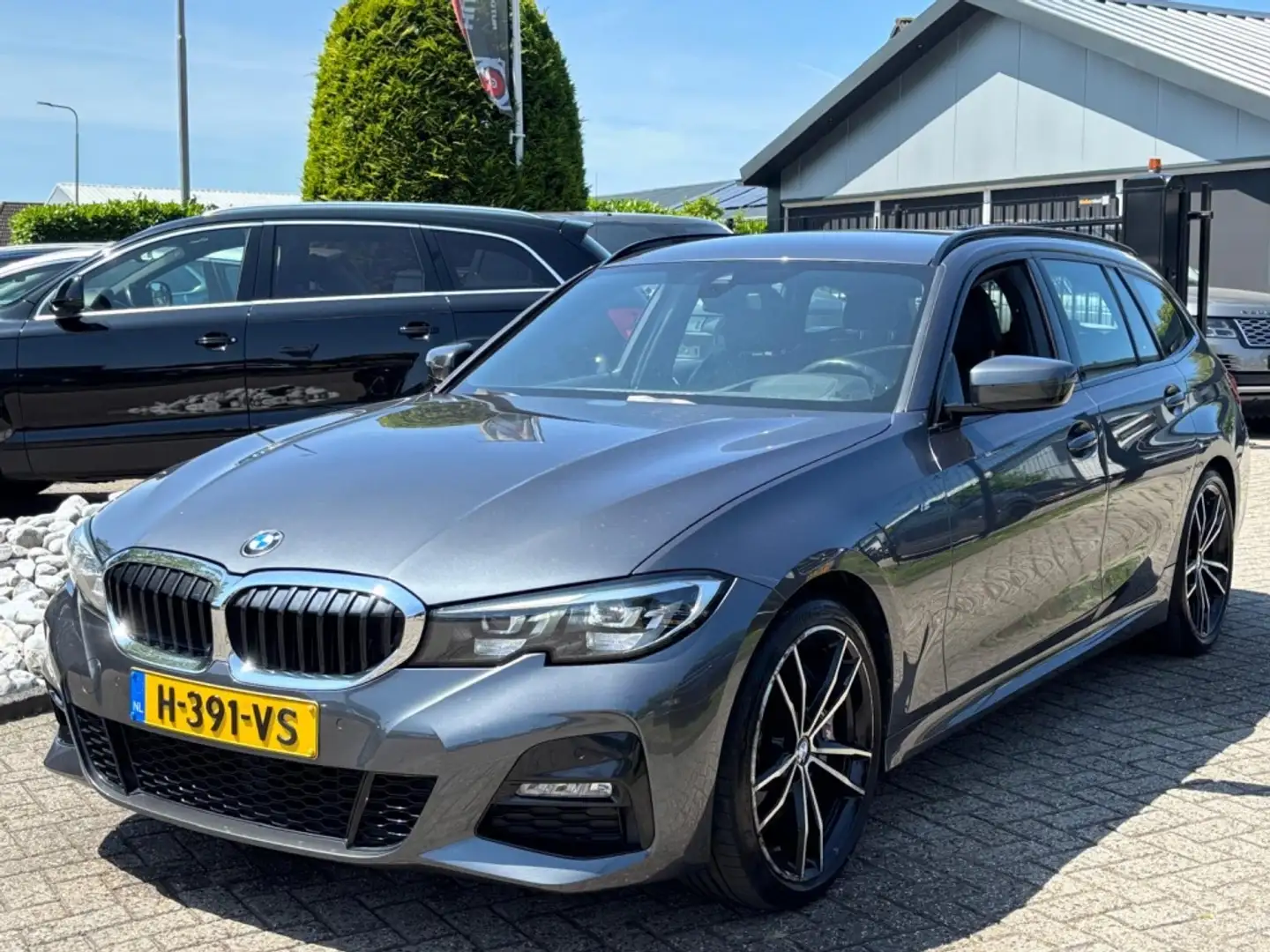 BMW 318 3-serie Touring 318i High Exe Aut 2020 M-Pakket De Grijs - 1