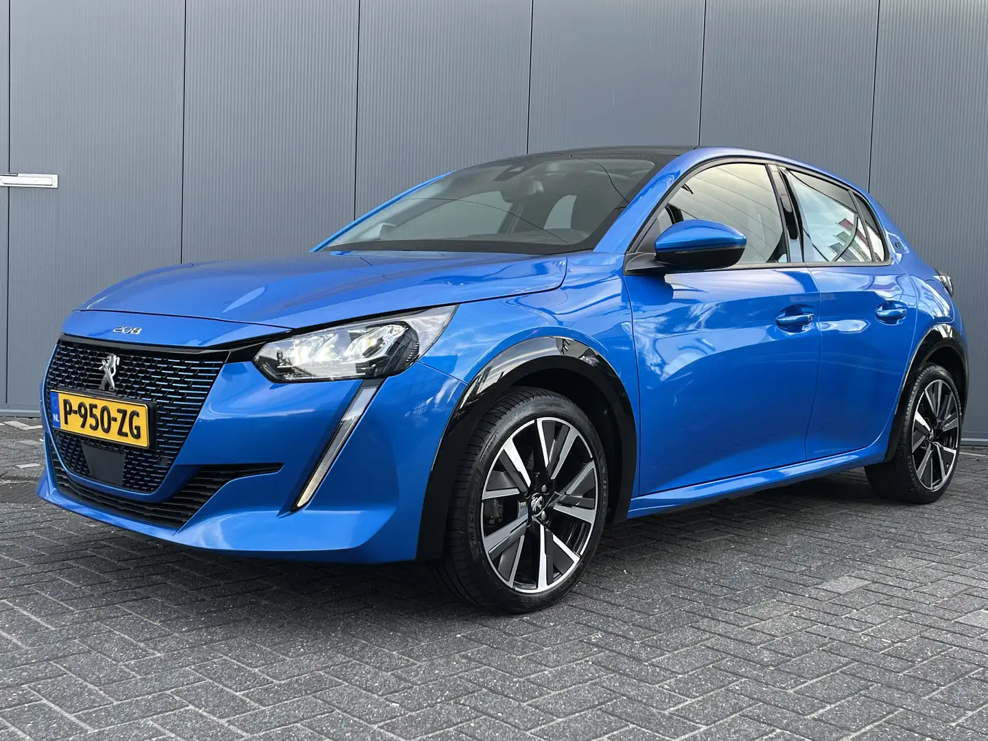 Peugeot e-208 EV Allure 50 kWh 136pk | Camera | 17'' Lichtmetale Blauw - 1