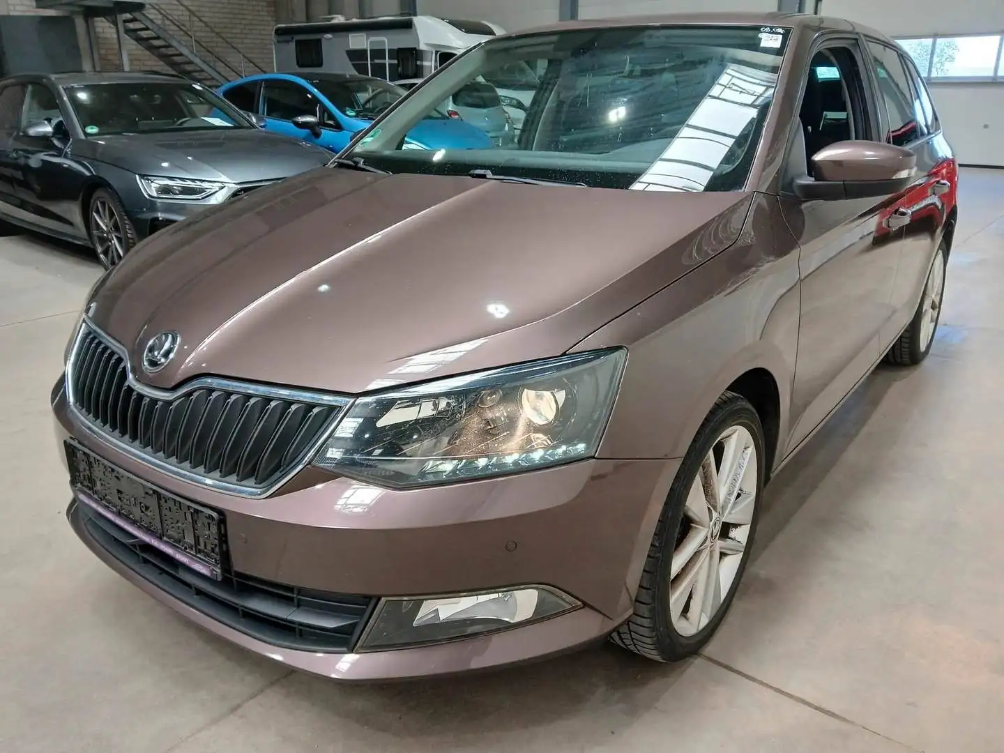 Skoda Fabia Combi Style 1.2 TSI *KAM*NAVI*PDC Braun - 1