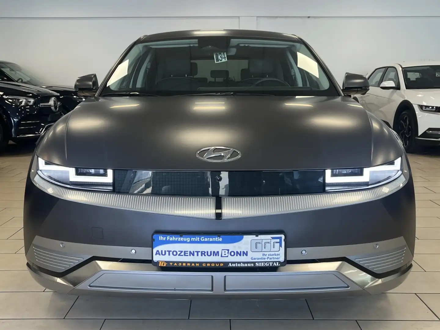 Hyundai IONIQ 5 Uniq*4WD*ACC*LED*WinterP.*Leder*Cam*Navi Grijs - 2