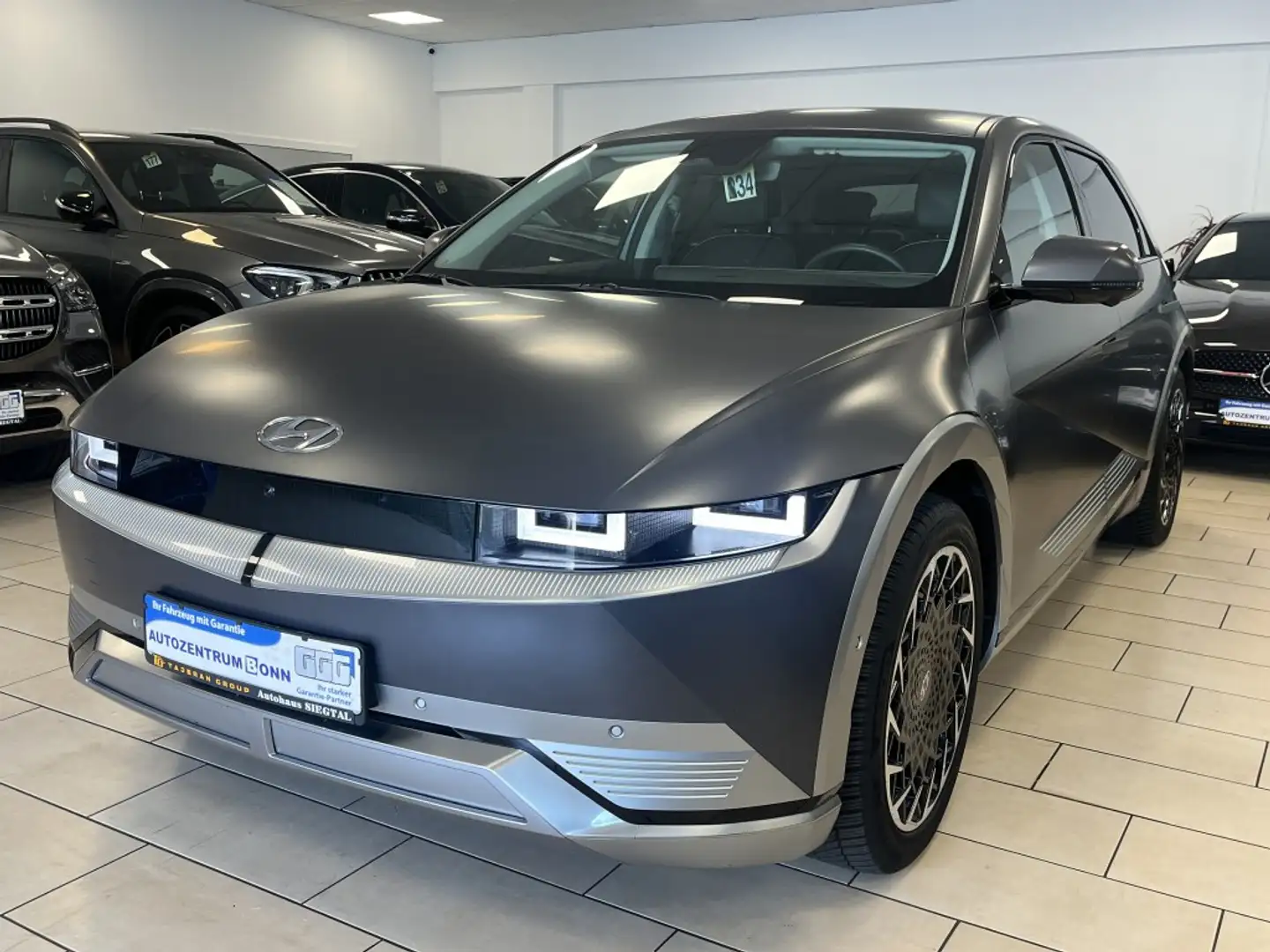 Hyundai IONIQ 5 Uniq*4WD*ACC*LED*WinterP.*Leder*Cam*Navi Grijs - 1