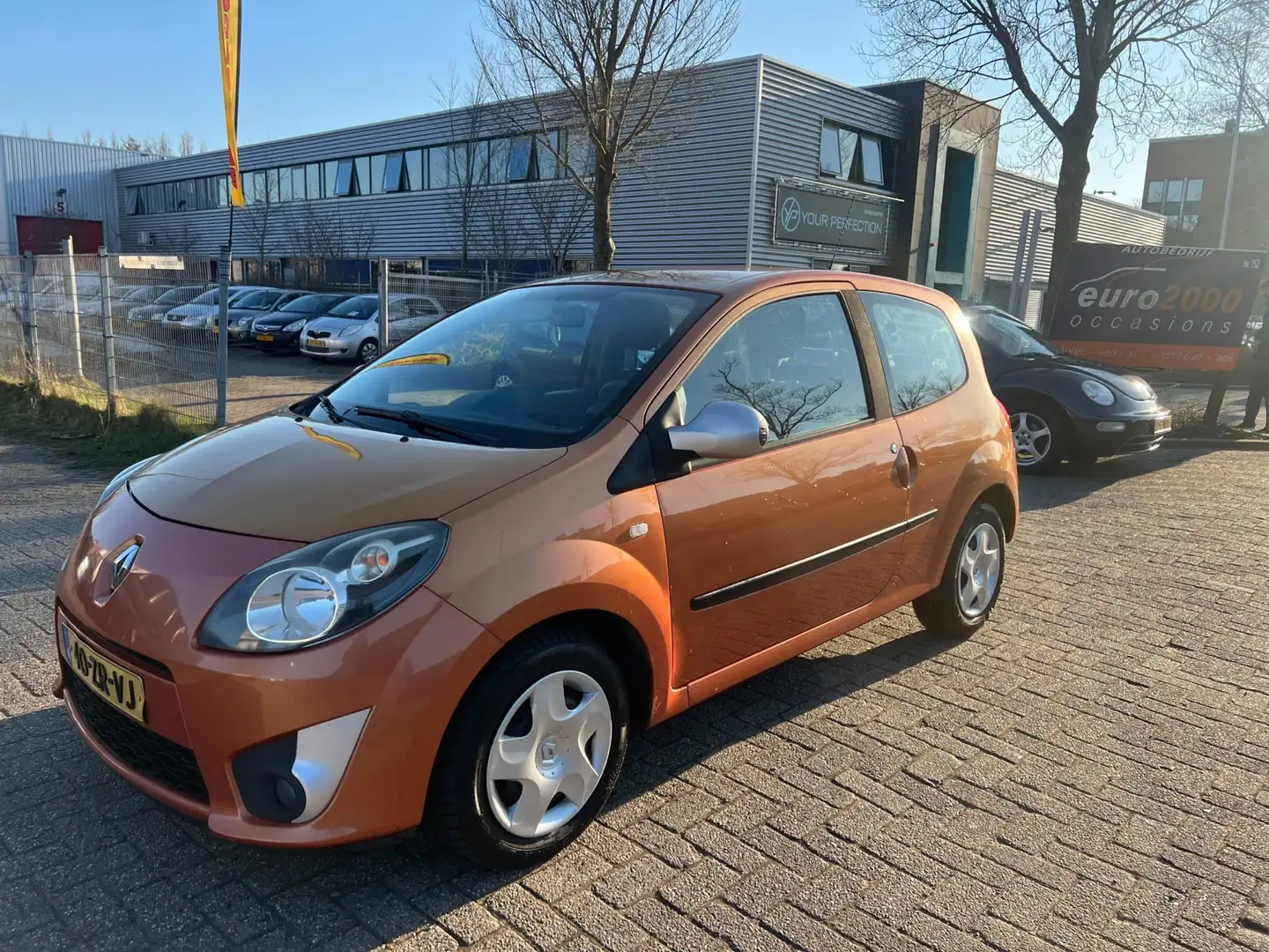 Renault Twingo 1.2 Dynamique - NIEUWE DISTRIBUTIERIEM Oranje - 1