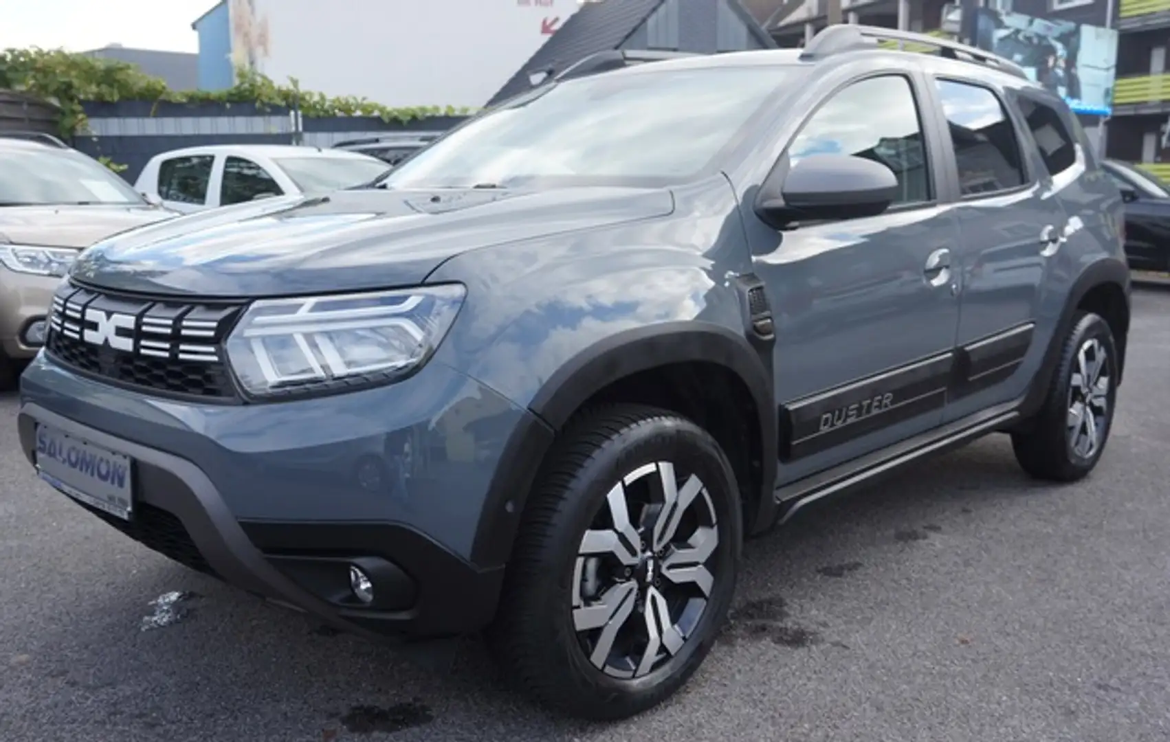 Dacia Duster TCe150*4x4*JOURNEY+ 17"ALU*NAVI+4xCAM*Sitzh Gris - 1