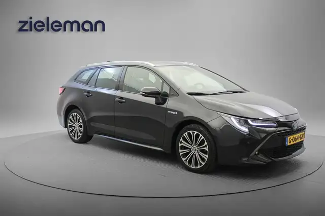 Toyota Corolla Touring Sports 1.8 Hybrid Business - Digitaal Cock