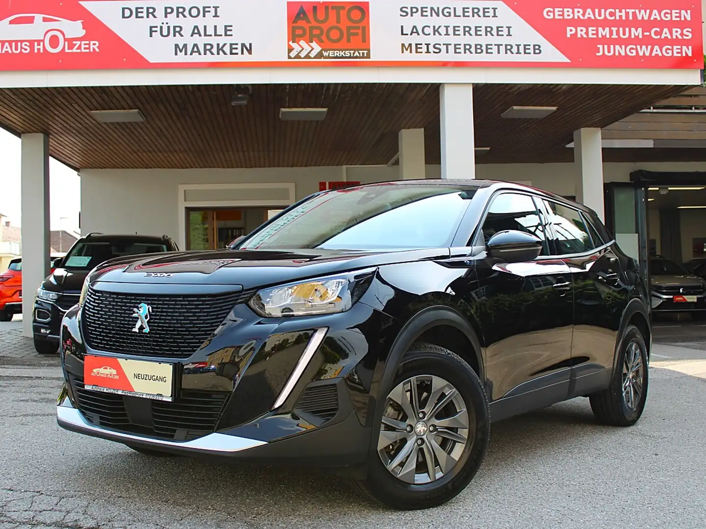 Peugeot e-2008 50 kWh Active Pack *1.Besitz* Schwarz - 1