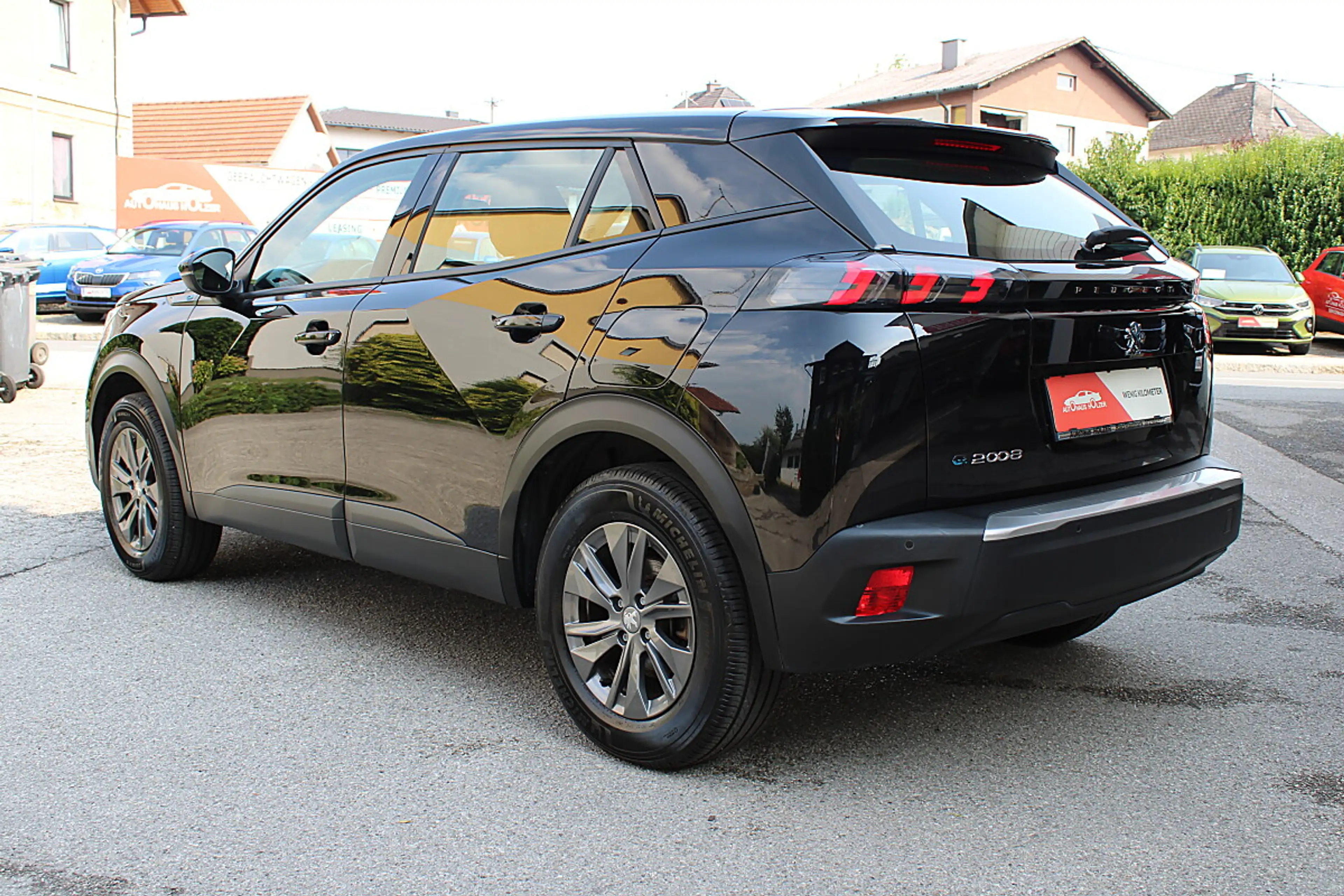 Peugeot e-2008 50 kWh Active Pack *1.Besitz* — photo 2