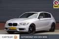 BMW 118 1-serie 118i Business+ 170PK AUT. NAP, LED, PANODA Grijs - thumbnail 1