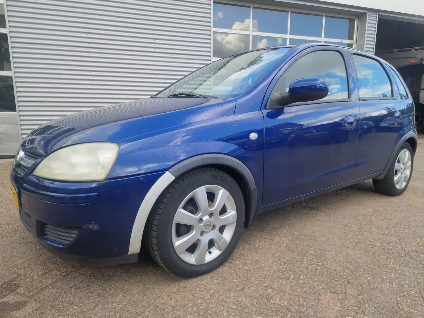 Opel Corsa 1.2-16V Full Rhythm Blauw - 1
