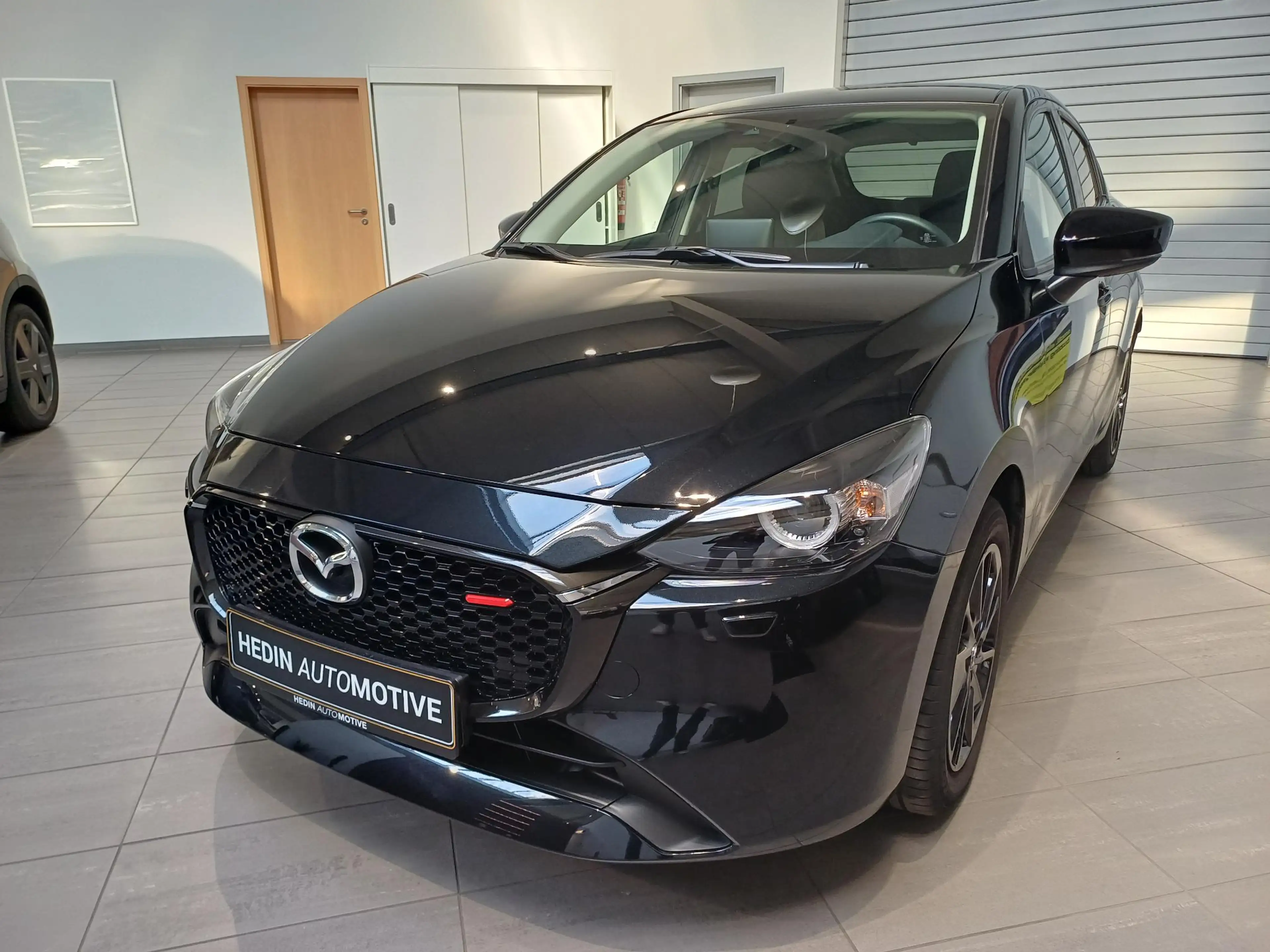 Mazda 2 — photo 2